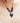 woman wearing blue lapis necklace