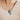 woman wearing teardrop pendant necklace