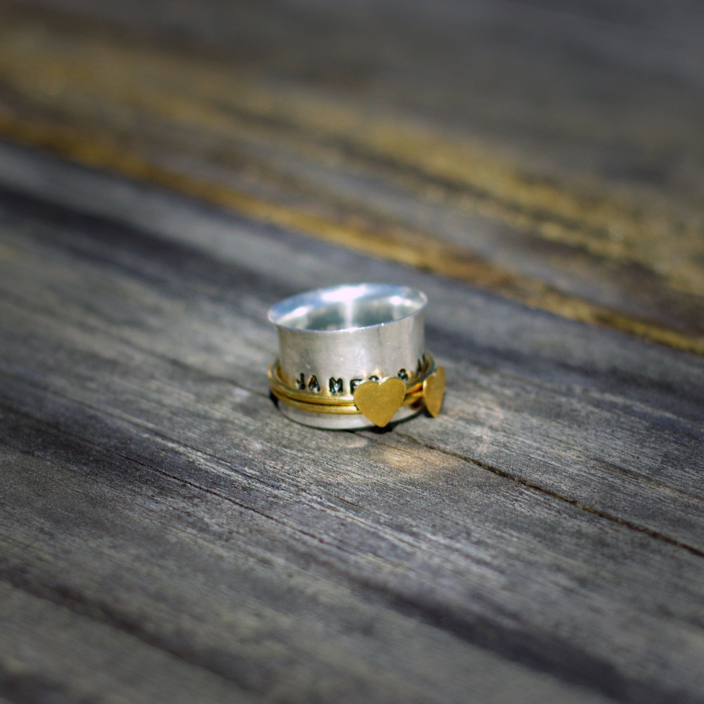 engraved silver spinner rings