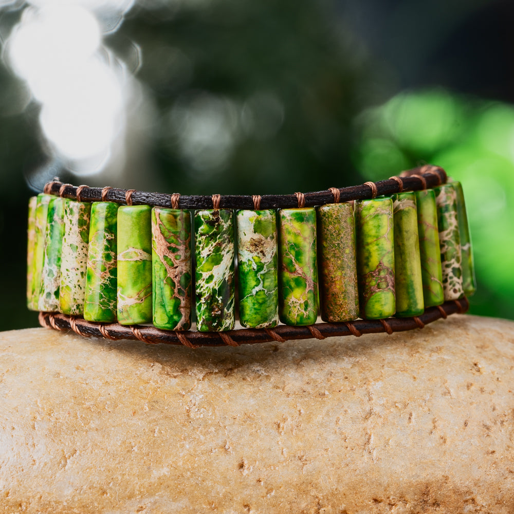 Experience the mesmerizing beauty of genuine leather and natural Jasper stones with this chic wrap bracelet.