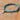 Treehut's stretchable bracelet with turquoise stone beads and a silver buddha charm in the center