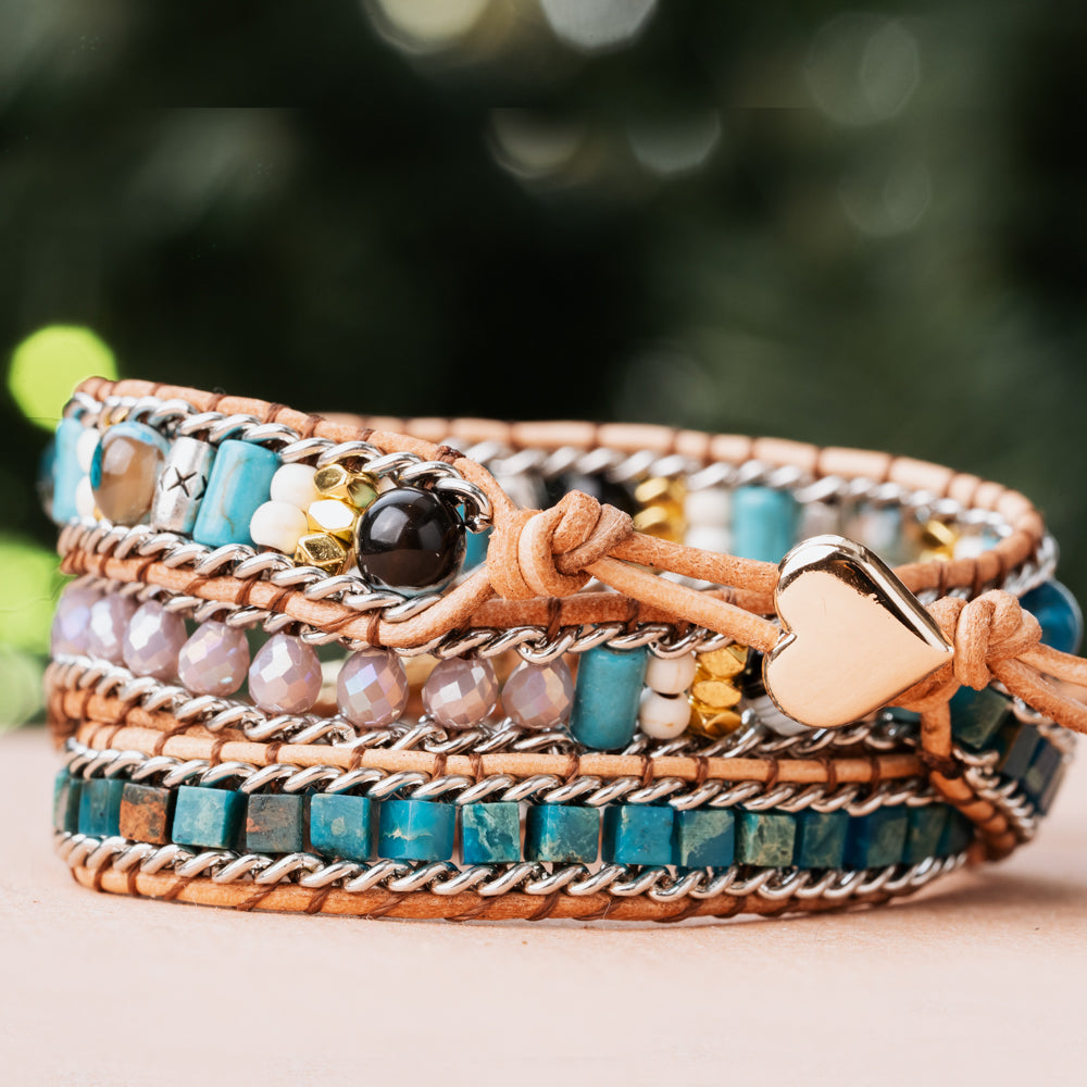 Treehut natural stone bracelet made with three leather wraps and natural opal crystal