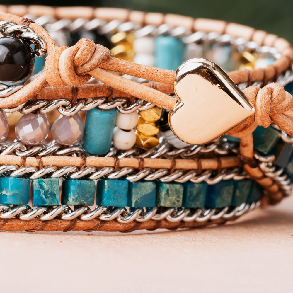 Three leather wrap bracelet made with natural blue opal stone and quartz crystals. Genuine three leather straps made by Treehut