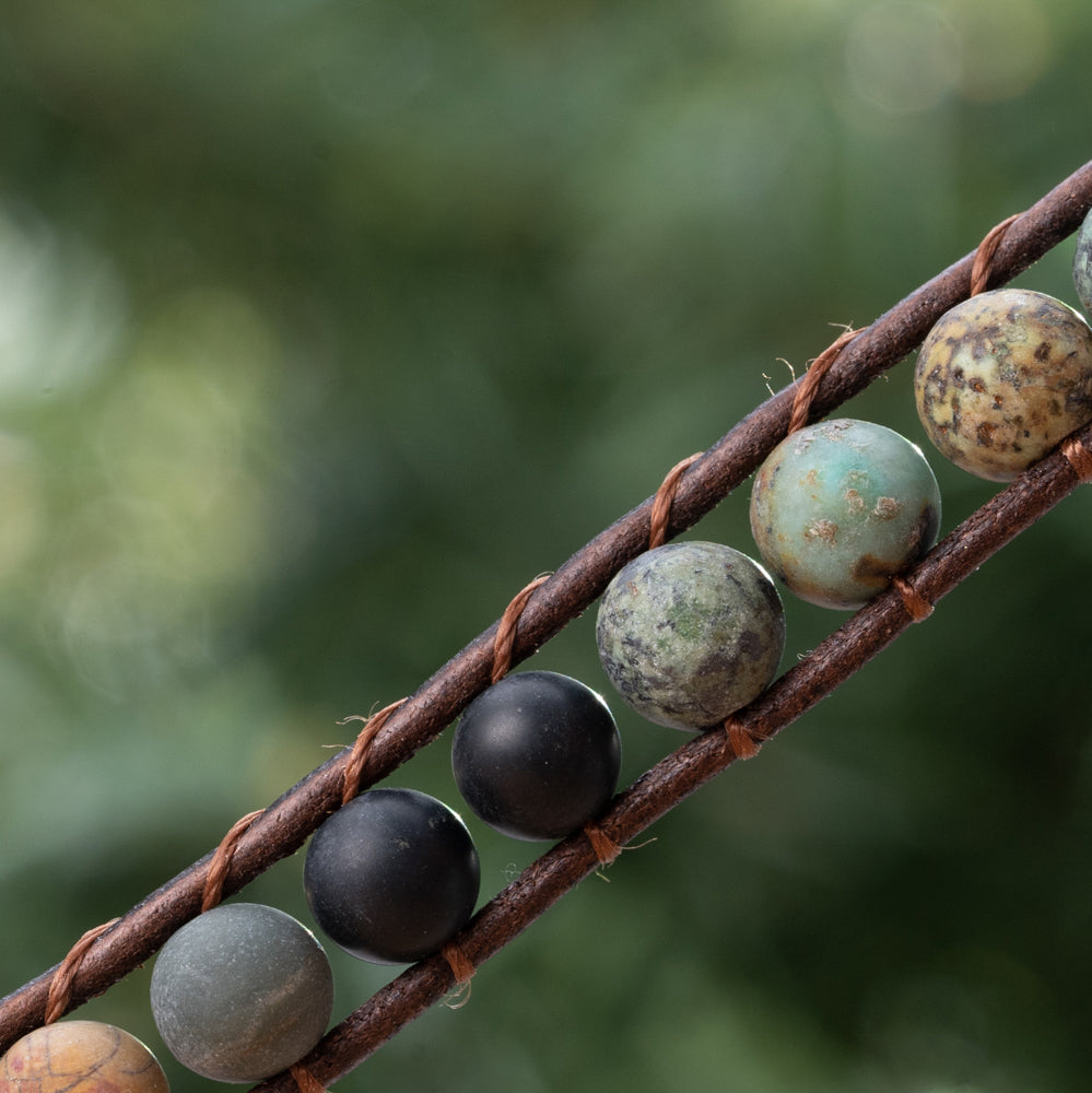 Natural African turquoise stone and black onyx stone bracelet with three genuine leather strap bracelets.