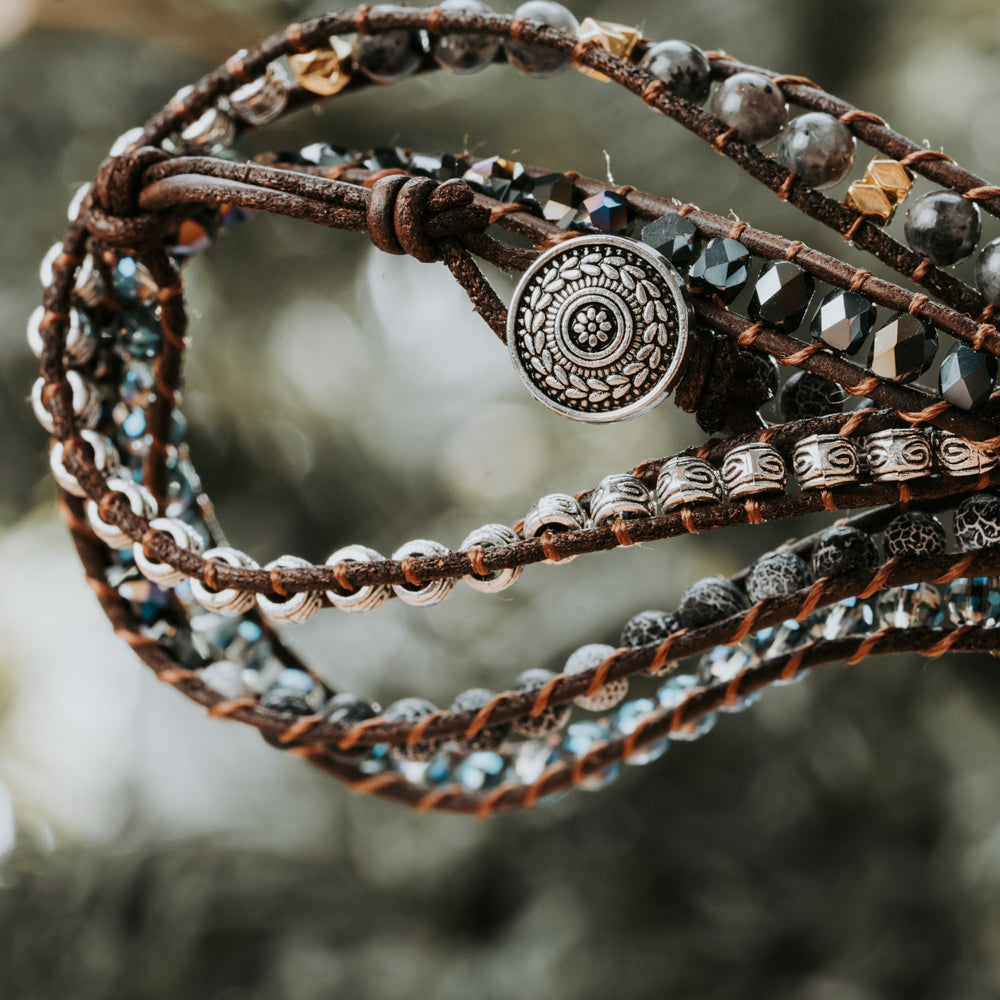 Black and silver natural stone bead bracelet with five leather straps