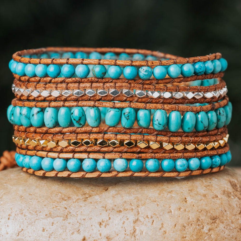 Treehut five-wrap bracelet is a true masterpiece, showcasing the natural beauty of Turquoise stone and Sterling Silver on genuine leather straps