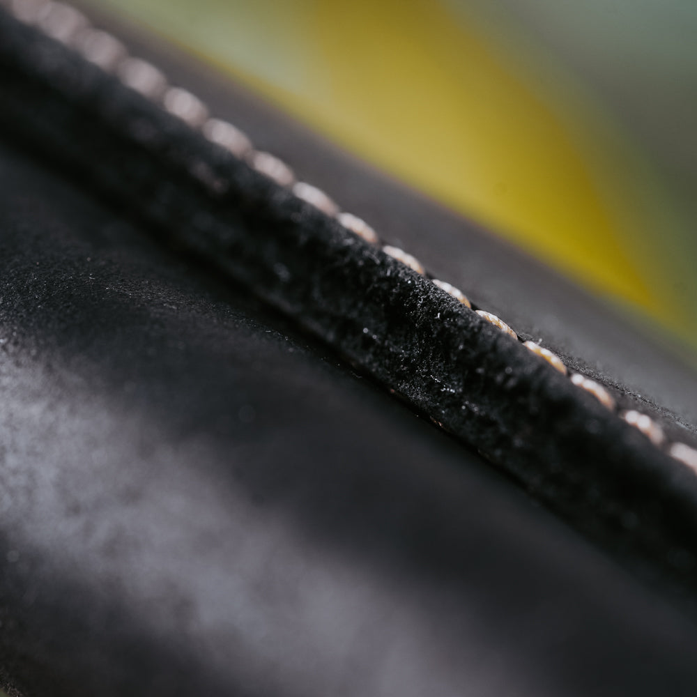 black leather trifold wallet