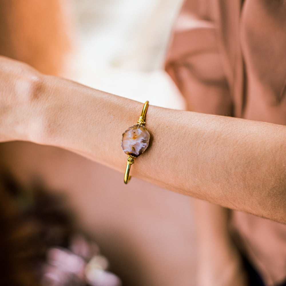woman wearing crystal cuff bracelet