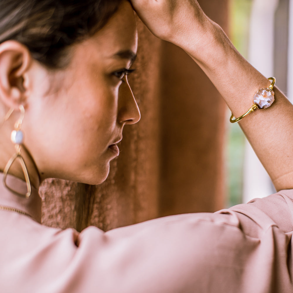 woman wearing crystal cuff bracelet