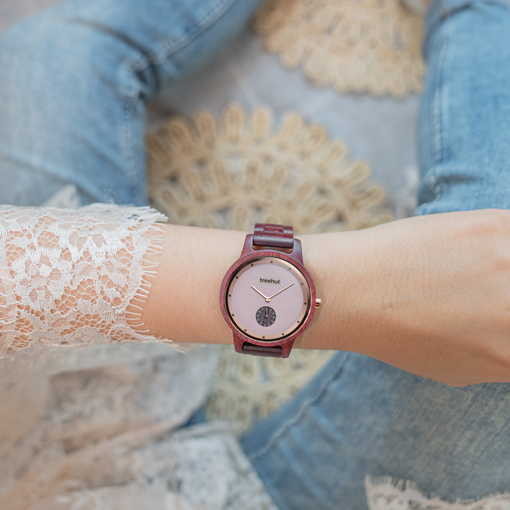 women’s wooden watch on wrist