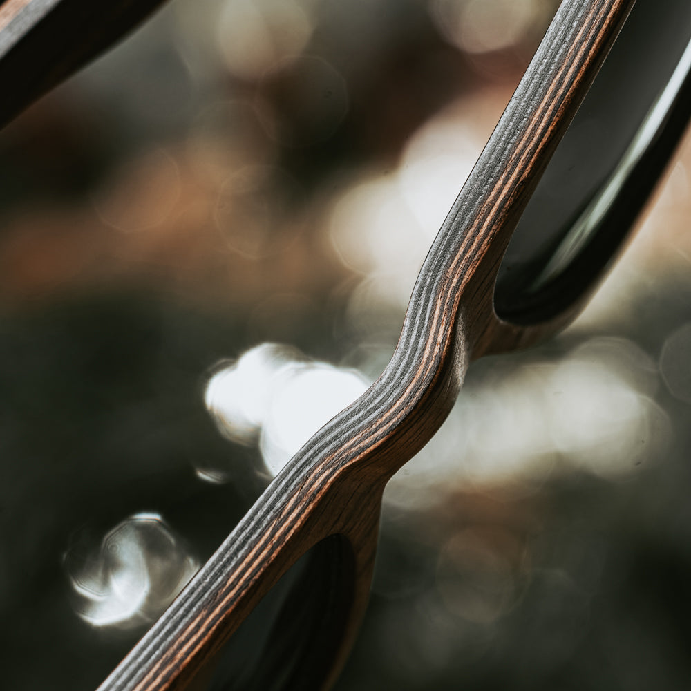 Grey and brown natural walnut wood sunglasses made with 100% UV protective sunglasses