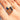woman wearing blue druzy ring