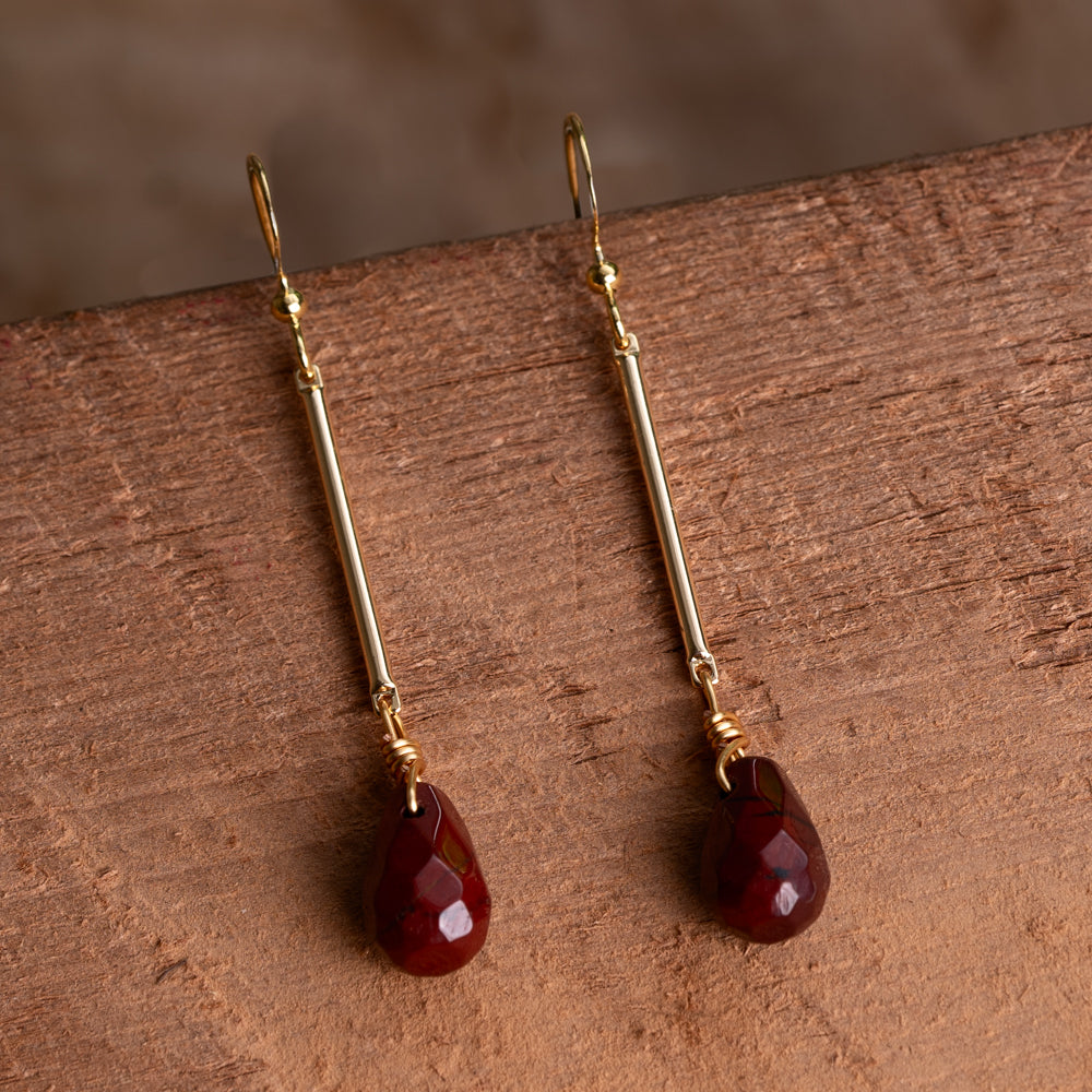 gold and red stone earrings