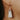 woman wearing white & gold stone earrings