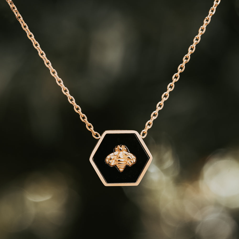 Black and gold hexagon gold bee necklace with cable chain