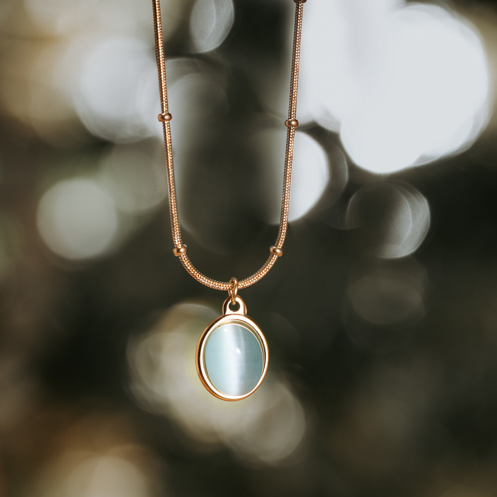Gold plated natural green opal oval stone necklace with snake and ball chain