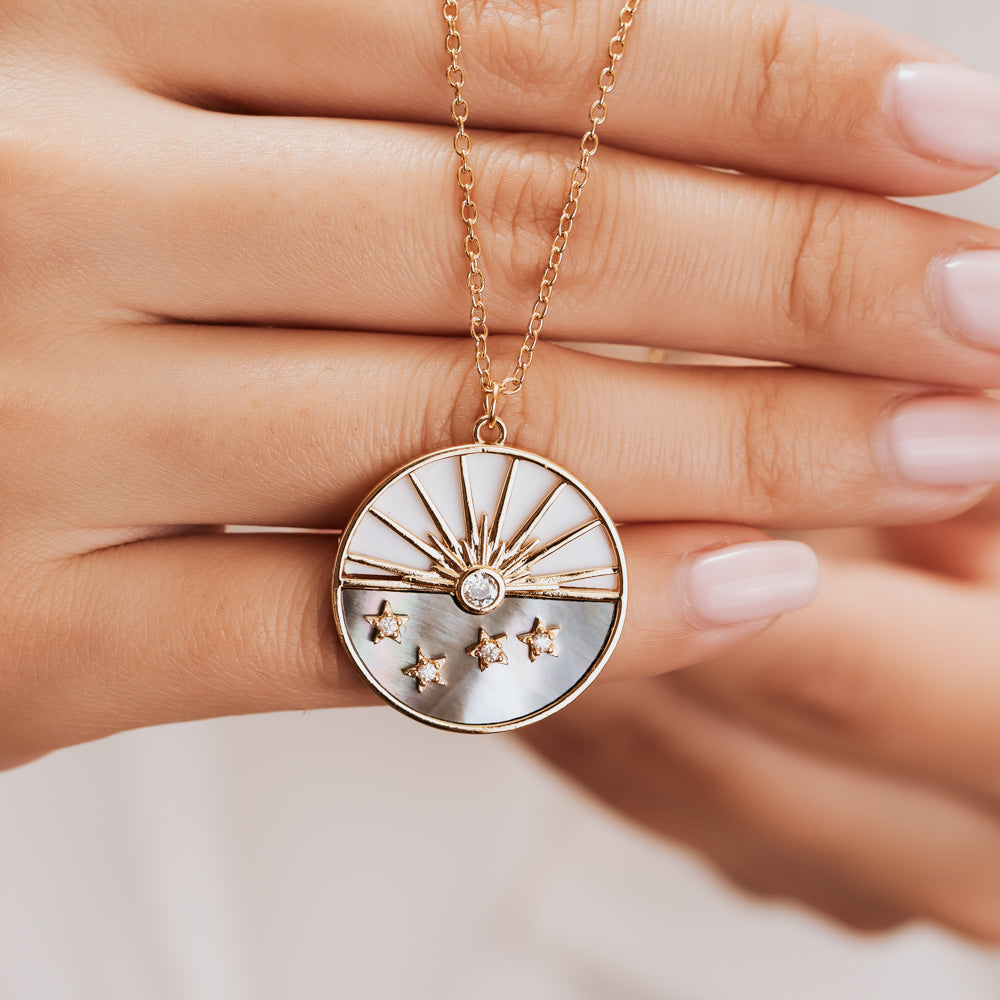 White and silver sun and star round pendant