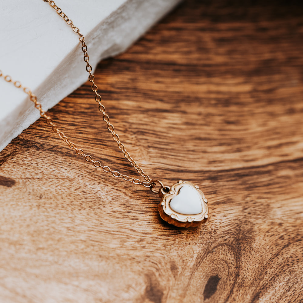 White and gold mother of pearl shell heart shaped necklace