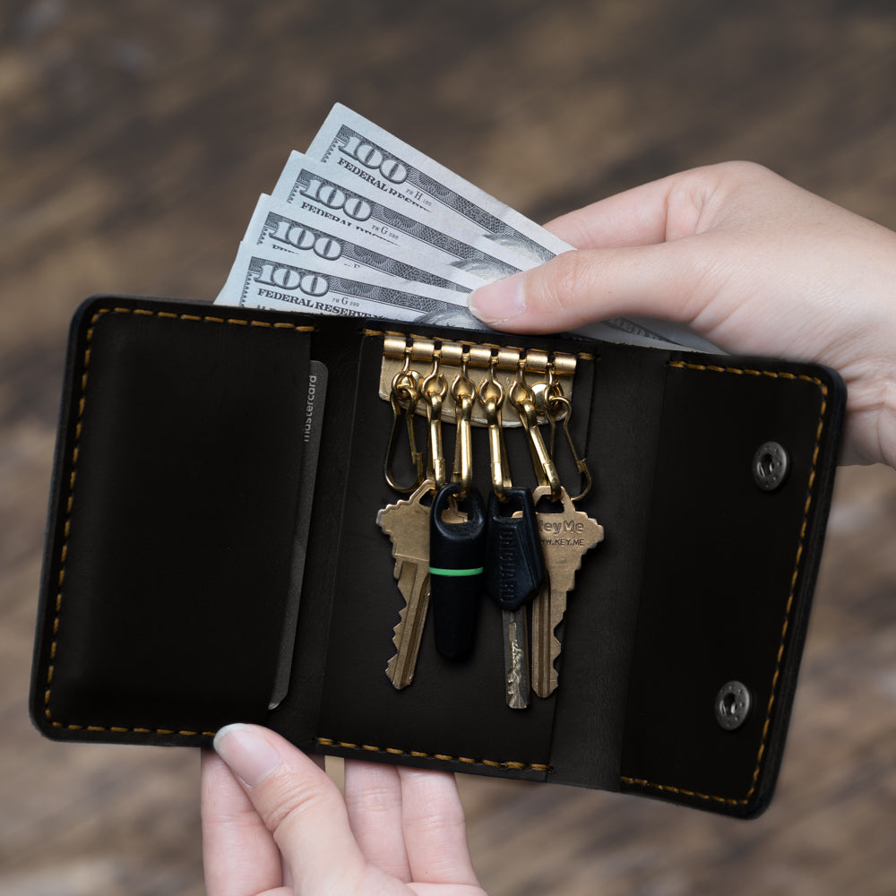 black leather trifold wallet