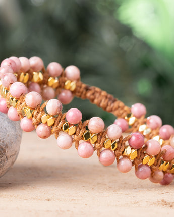 Treehut natural stone bracelet with light pink natural rhodonite stones and faceted gold nuggets. 