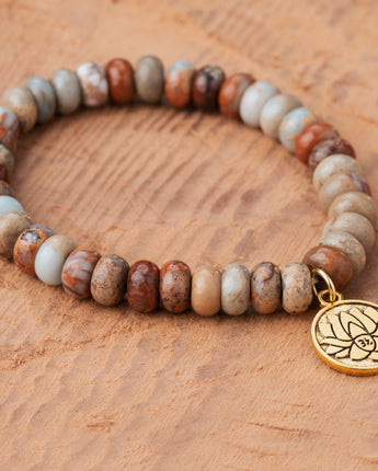 Treehut Women's bracelet handbeaded with earthy and nude brown japser stone beads and a lotus charm 