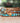 Handcrafted triple-wrap leather bracelet with three layers of natural turquoise stone beads, a chunky center stone, gold bead nuggets, and silver beads by Treehut
