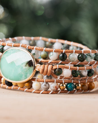 Experience the subtle yet striking beauty of rare Jade stone paired with dark hues of African Turquoise and Onyx stones in this artisanal Treehut wrap bracelet