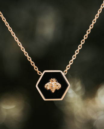Black and gold hexagon gold bee necklace with cable chain 