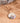 Cubic zirconia and gold chain necklace round shaped