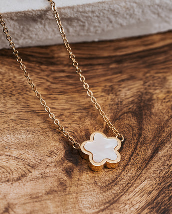White and gold flower shaped necklace