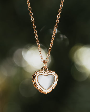 White and gold heart-shaped necklace with gold plated chain 
